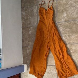 Anthropologie Burnt Orange Open back Adjustable Jumpsuit size small